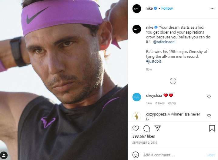 Nike's Instagram post featuring rafael nadal and their branded hashtag #JustDoIt